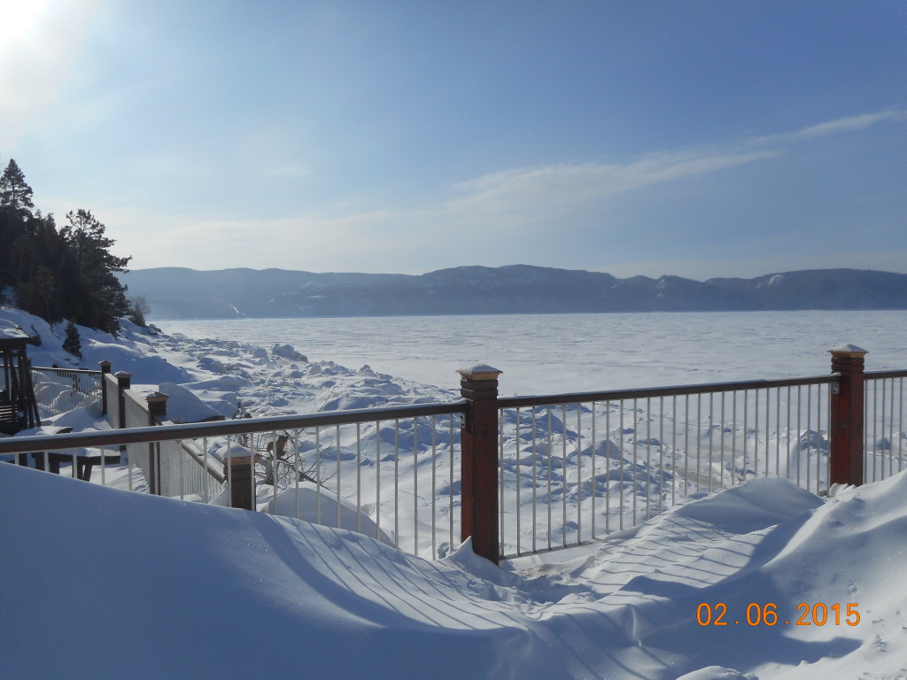 looking over the wharf down the river