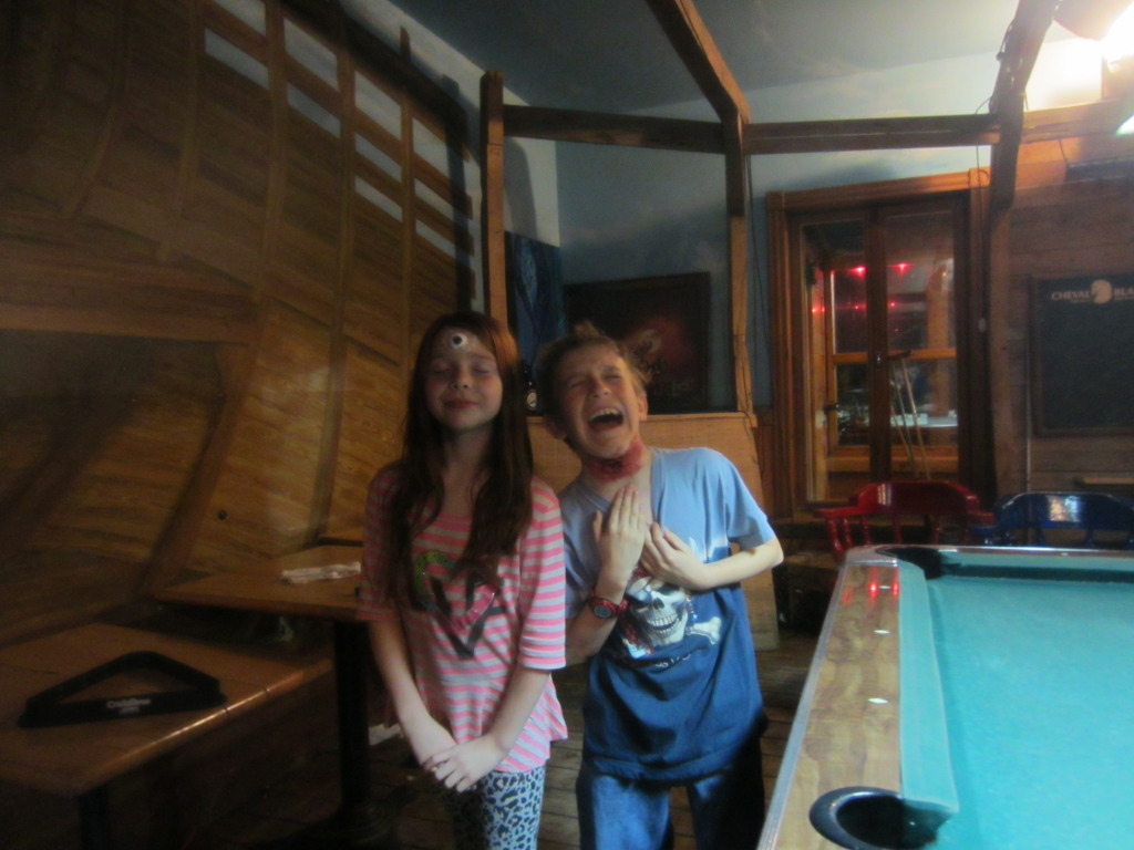 Post makeup: a cyclops and a throat slashed victim of Zombies